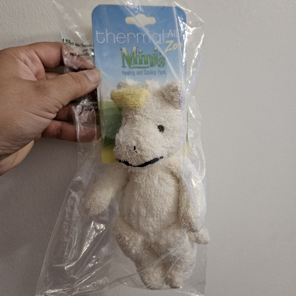 NWT Thermal-Aid cream and Yellow Stuffed Unicorn Toy